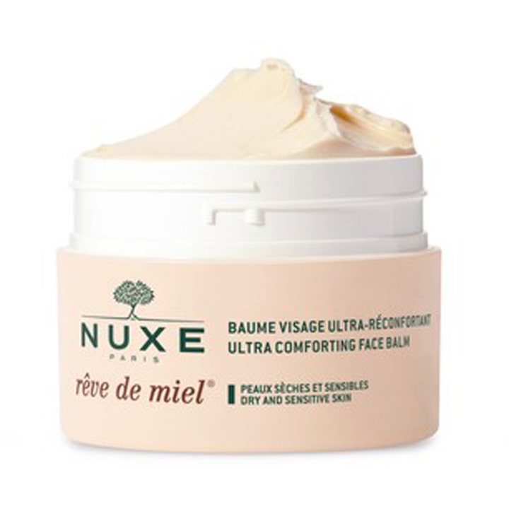 Nuxe Rêve de Miel 50 ml ger en lugnande balm för torr hud i beige burk med synlig krämig textur.