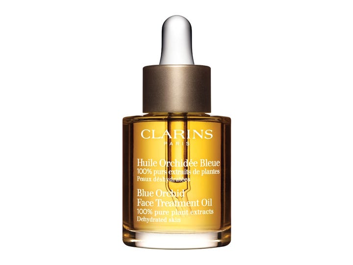 Clarins Blue Orchid Face Treatment Oil 30 ml lyxig naturlig ansiktsolja ger fukt med växtextrakt i flaska med guldpipett.