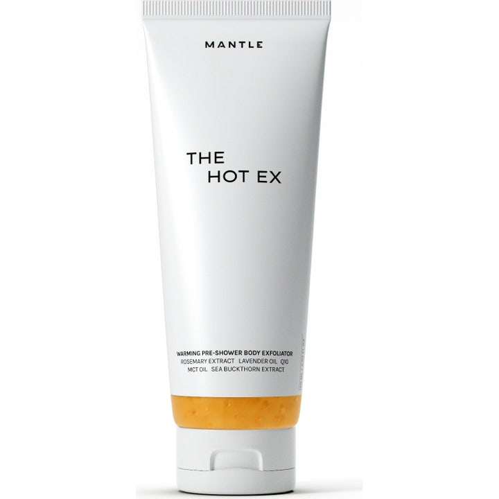 MANTLE The Hot Ex 150 ml exfolierande kroppsskrubb med Q10 värmande kroppscrub i vit tub med synlig orange gel