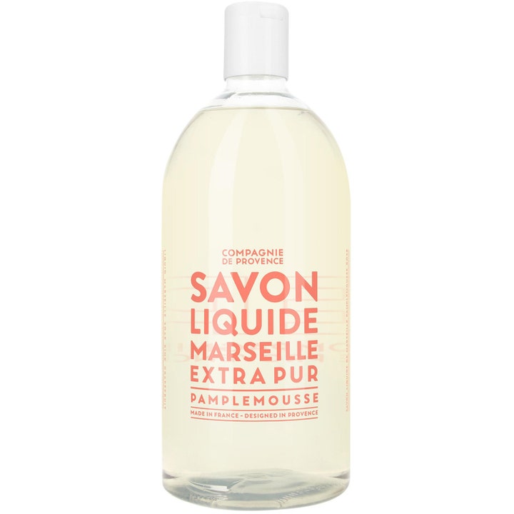 Compagnie de Provence Savon Liquide 1000ml flytande handtvål refill med rosa grapefrukt i klar plastflaska.