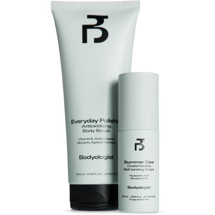 Bodyologist Glow Duo Gift Set lystergivande kroppsvård med en exfolierande scrub och brun utan sol-droppar i ljusgrå design.