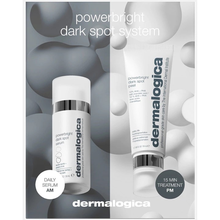 Dermalogica Powerbright Dark Spot System mot pigmentfläckar kräm i vita förpackningar mot grå bubblig bakgrund.