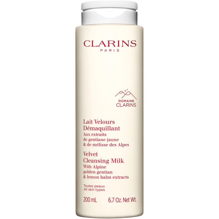 Clarins Velvet Cleansing Milk 200 ml clarins daglig rengöringsmjölk i en hög beige flaska med rött tryck och vitt lock