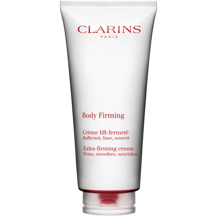 Clarins Body Firming anti-aging uppstramande kräm ger fastare hud i en vit tub med röd text och lock.