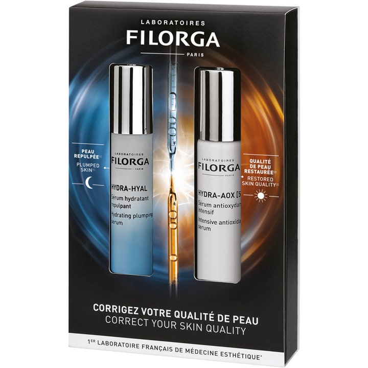Filorga Hydra-Hyal och Hydra-AOX serumkit ger lyster i svart box med frostade flaskor och silverlock.