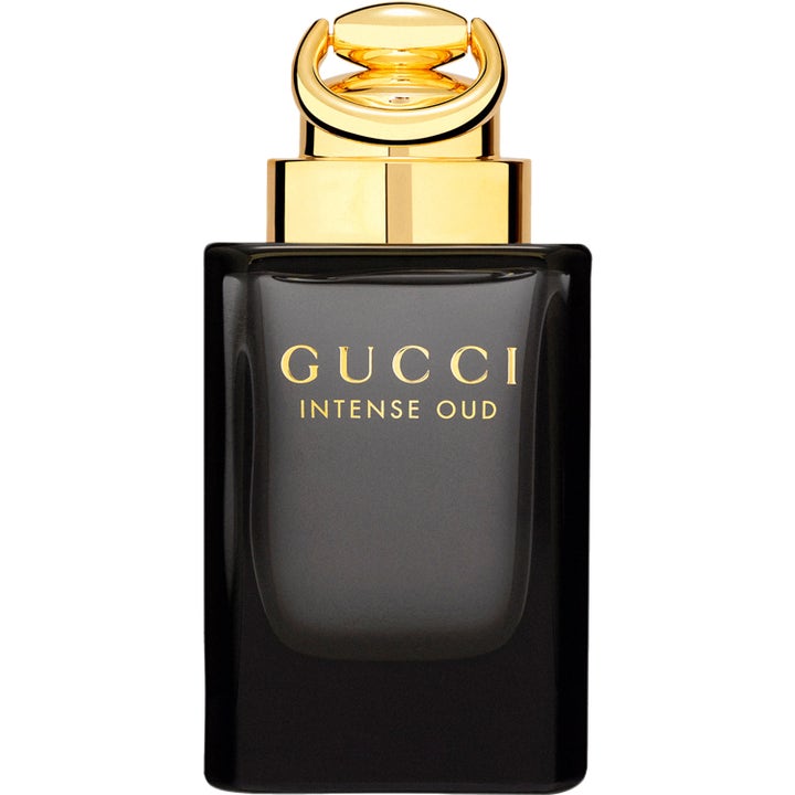 Gucci Intense Oud 90ml herrparfym i en svart glasflaska med guldtext och lock format som ett betsel