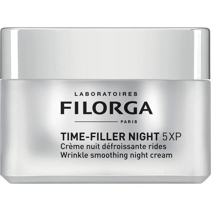 Filorga Time-Filler Night 5XP 50 ml anti-aging nattkräm ger avancerad rynkreducering i en fyrkantig silverfärgad burk.