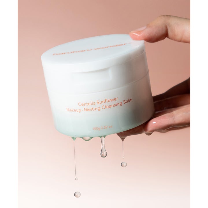 haruharu wonder Centella Sunflower Makeup-Melting Cleansing Balm 100 g sminklössande rengöringsbalm i vit burk med droppande olja
