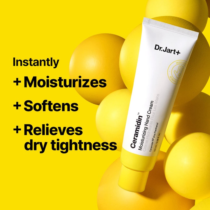 Dr.Jart+ Ceramidin Moisturizing Hand Cream 100 ml återfuktande handkräm i vit tub omgiven av gula sfärer.