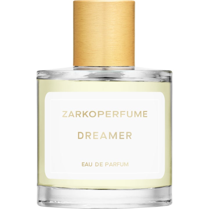 Zarkoperfume Dreamer 100 ml parfym i en elegant cylinderformad glasflaska med glänsande guldkork och ljusgul vätska