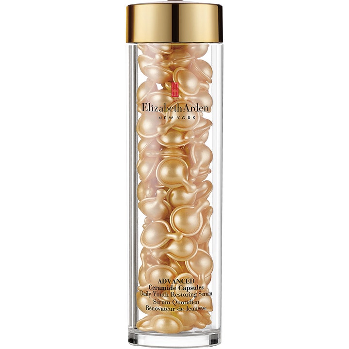 Elizabeth Arden Advanced Ceramide Capsules ceramide kapslar serum för anti-age i en genomskinlig cylinder med guldlock.