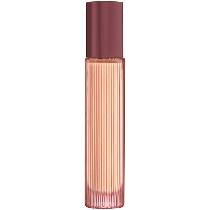 Tom Ford Café Rose travel size 10ml eau de parfum i en räfflad rosa glasflaska med mörkrosa metallock