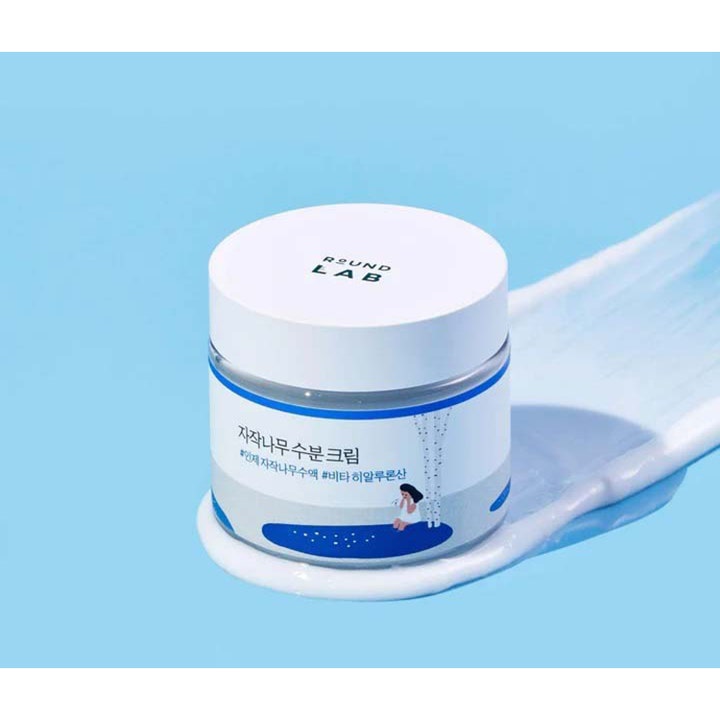 Round Lab Birch Juice Moisturizing Cream 80 ml återfuktande björksav ansiktskräm i vit burk med krämig vit textur