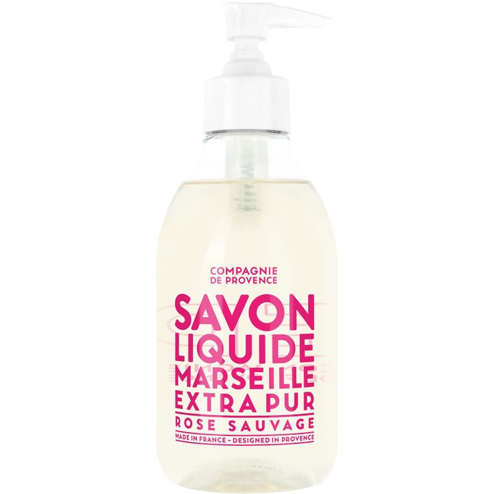Compagnie de Provence Rose Sauvage lyxig handtvål från provence i klar plastflaska med vit pump och rosa text.