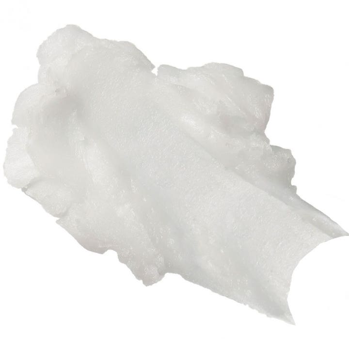 Clinique Take The Day Off Cleansing Balm 30 ml ansiktsrengöring med krämig vit textur som löser upp smink.