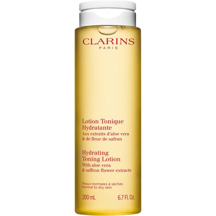 Clarins Hydrating Toning Lotion 200 ml återfuktande ansiktsvatten med aloe vera ger fukt i en flaska med gul vätska.