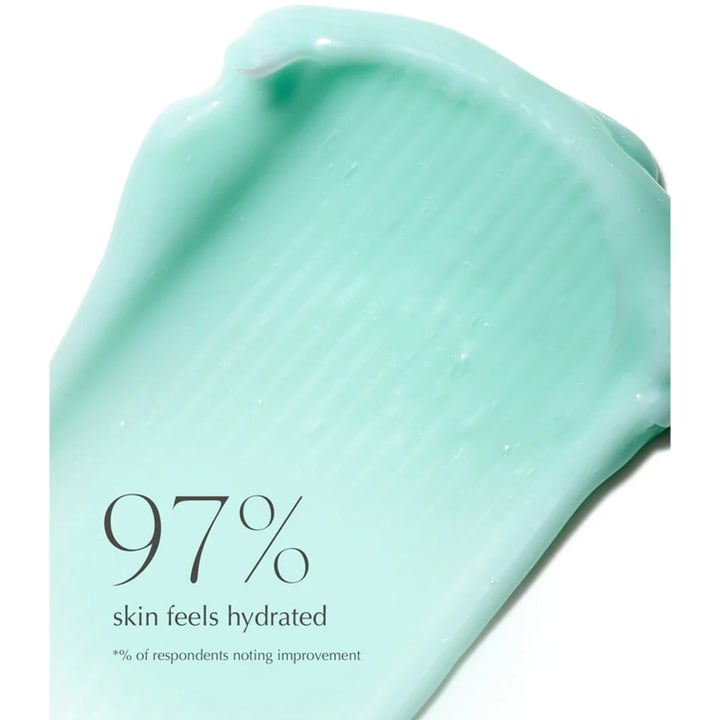 Exuviance Age Reverse Hydrafirm 50 g fast ansiktskräm återfuktande i ljusgrön textur med texten 97% skin feels hydrated