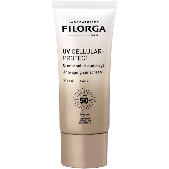Filorga UV Cellular-Protect anti-aging solskyddskräm ansiktet i en vit och beige gradient tub med SPF50