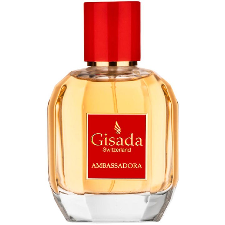 Gisada Ambassadora Eau de Parfum 100 ml damparfym i fasetterad glasflaska med guldgul vätska och röd kork