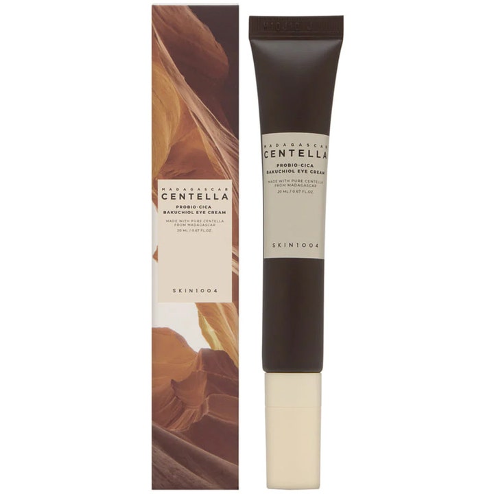 SKIN1004 Madagascar Centella Bakuchiol Eye Cream 20 ml vårdande ögonkräm i mörkbrun tub bredvid ask med naturmotiv
