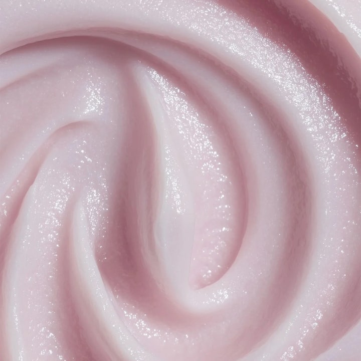 MANTLE The Miracle Mask 75 ml exfoliering ansiktsbehandling visar en krämig ljusrosa textur i en mjuk virvel.