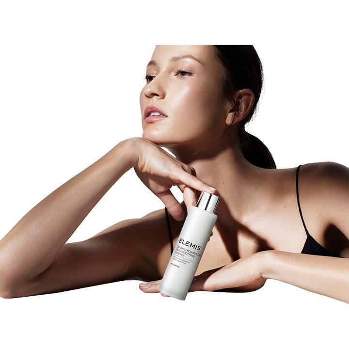 Elemis Dynamic Resurfacing Skin Smoothing Essence 100 ml enzym exfoliering ansikte i vit flaska för lyster.