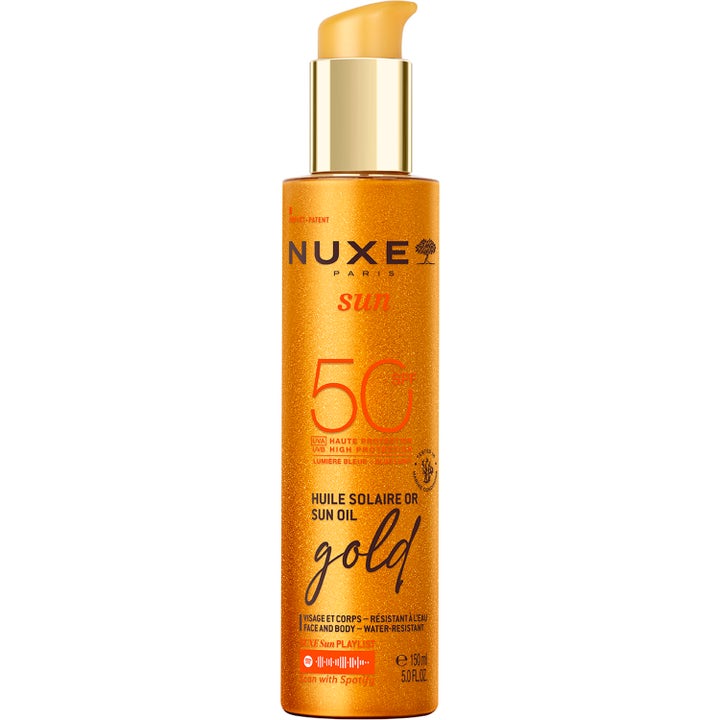 Nuxe Sun Oil Gold 150ml lyxig sololja med spf50 ansikt och kropp i en skimrande orange flaska med guldfärgad pump