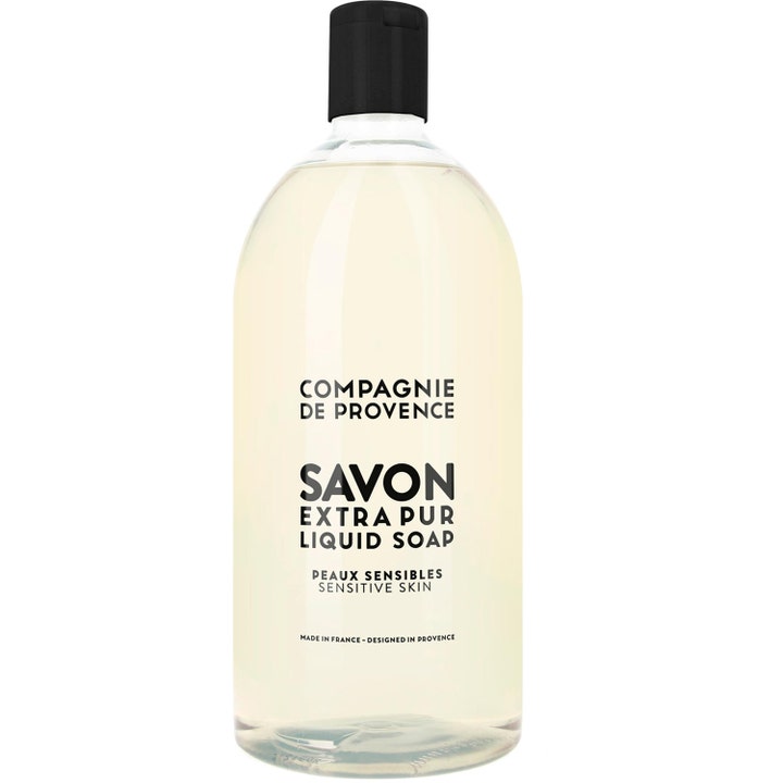 Compagnie de Provence Savon Extra Pur Liquid Soap 1000ml skonsam tvål refill i genomskinlig flaska med svart kork.