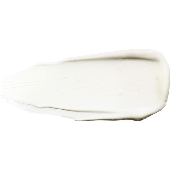 Exuviance Daily Corrector SPF35 40 g solkräm för ansiktet med en krämig vit textur som ger daglig hudutjämning.