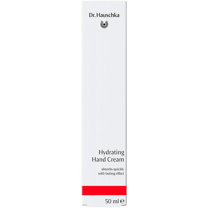 Dr. Hauschka Hand Cream 50 ml återfuktande handkräm som absorberas snabbt i vit ytterförpackning med röd detalj.