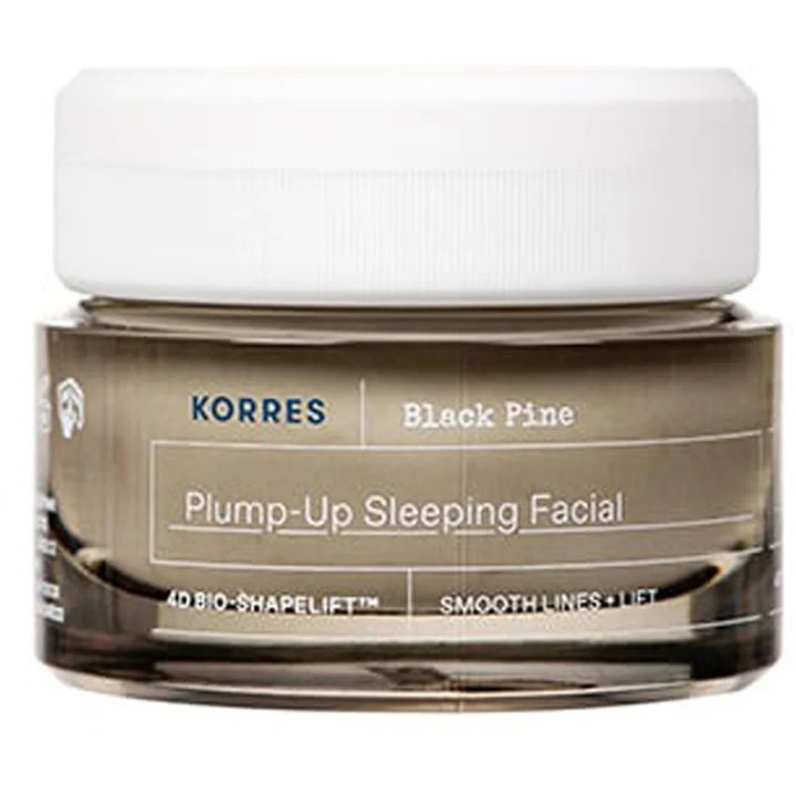 Korres Black Pine Plump-Up Sleeping Facial 40ml nattkräm för intensiv rynkreducering i mörk glasburk med vitt lock.