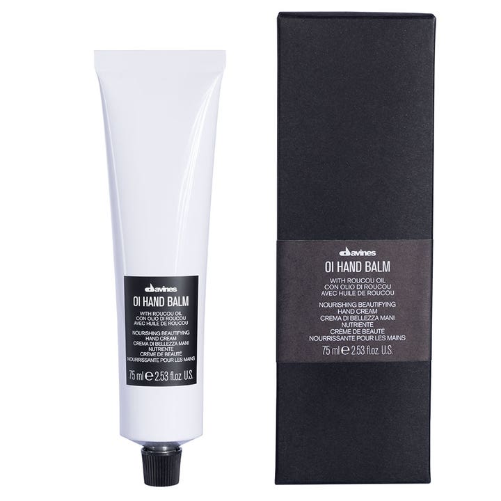 Davines OI Hand Balm 75 ml intensivt återfuktande handkräm i vit tub bredvid en stilren svart ytterkartong.