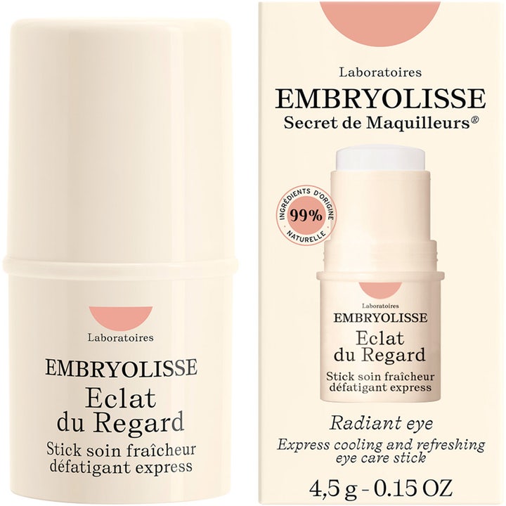 Embryolisse Radiant Eye 4,5 g svalkande ögonkräm i stickformat bredvid dess ytterförpackning
