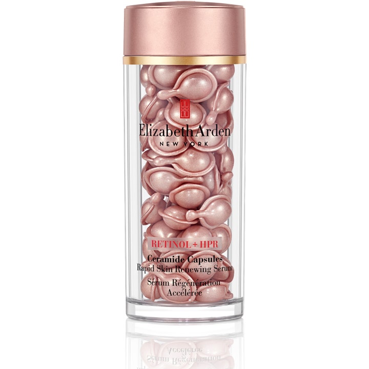 Elizabeth Arden Retinol + HPR Ceramide Capsules hudförnyande retinol serum med rosa kapslar i burk med roséguldfärgat lock.