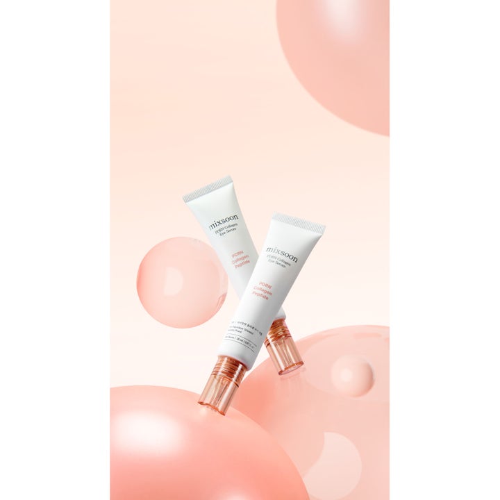 Mixsoon PDRN Collagen Eye Serum 20 ml uppstramande ögonkräm i vita tuber med roséguldslock bland rosa bubblor
