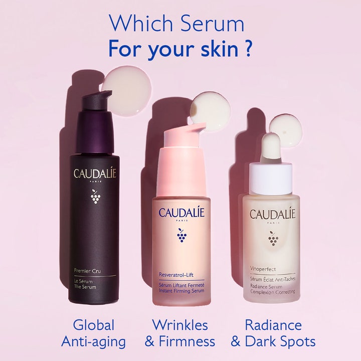 Caudalie Resveratrol-Lift Instant Firming Serum 30 ml uppstramande serum i rosa flaska bredvid andra serum
