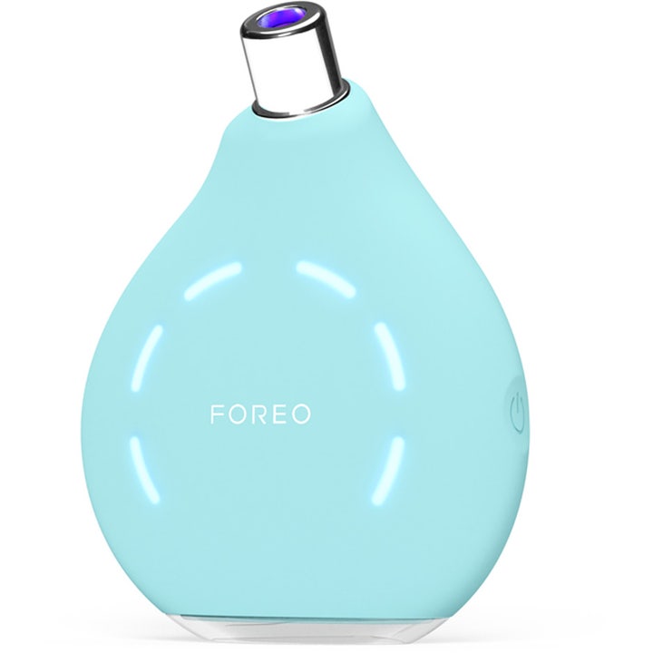 FOREO KIWI 1 st pormasksugar som ger renare hy i en droppformad turkos beauty tech-enhet med ljusdetaljer.