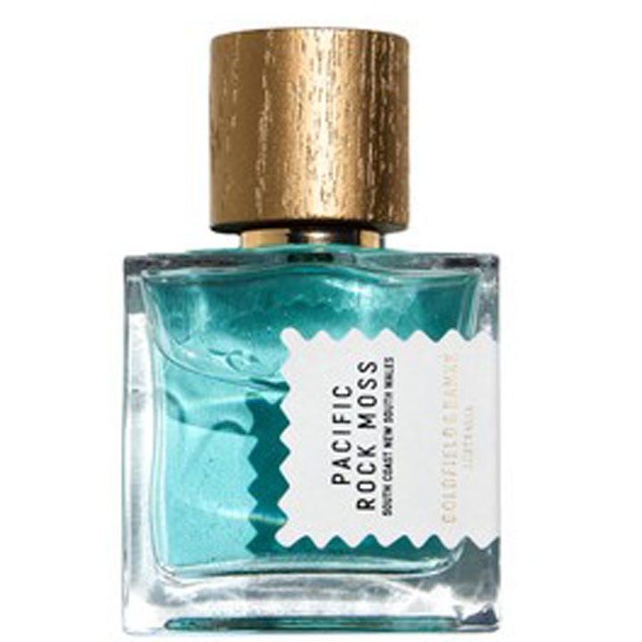 Goldfield & Banks Pacific Rock Moss 50 ml akvatisk parfym i en glasflaska med turkos vätska och guldlock med trästruktur
