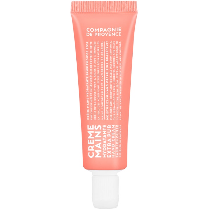 Compagnie de Provence Hand Cream Pink Grapefruit återfuktande fransk handkräm i en korallrosa tub med vitt lock