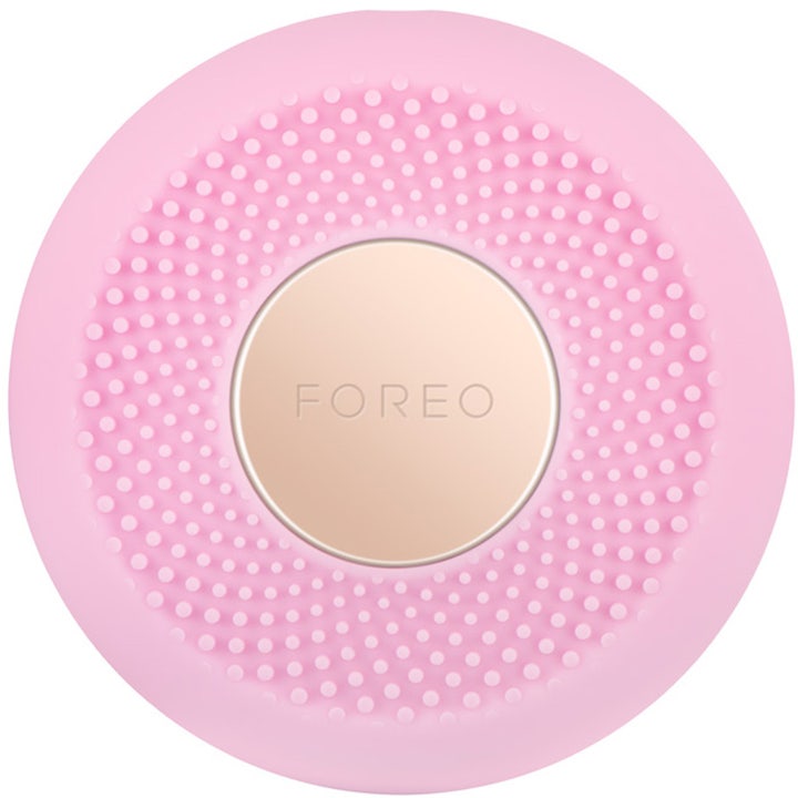 Foreo UFO beauty device för led terapi ansiktsbehandling hemma i rosa silikon med räfflad yta och guldplatta